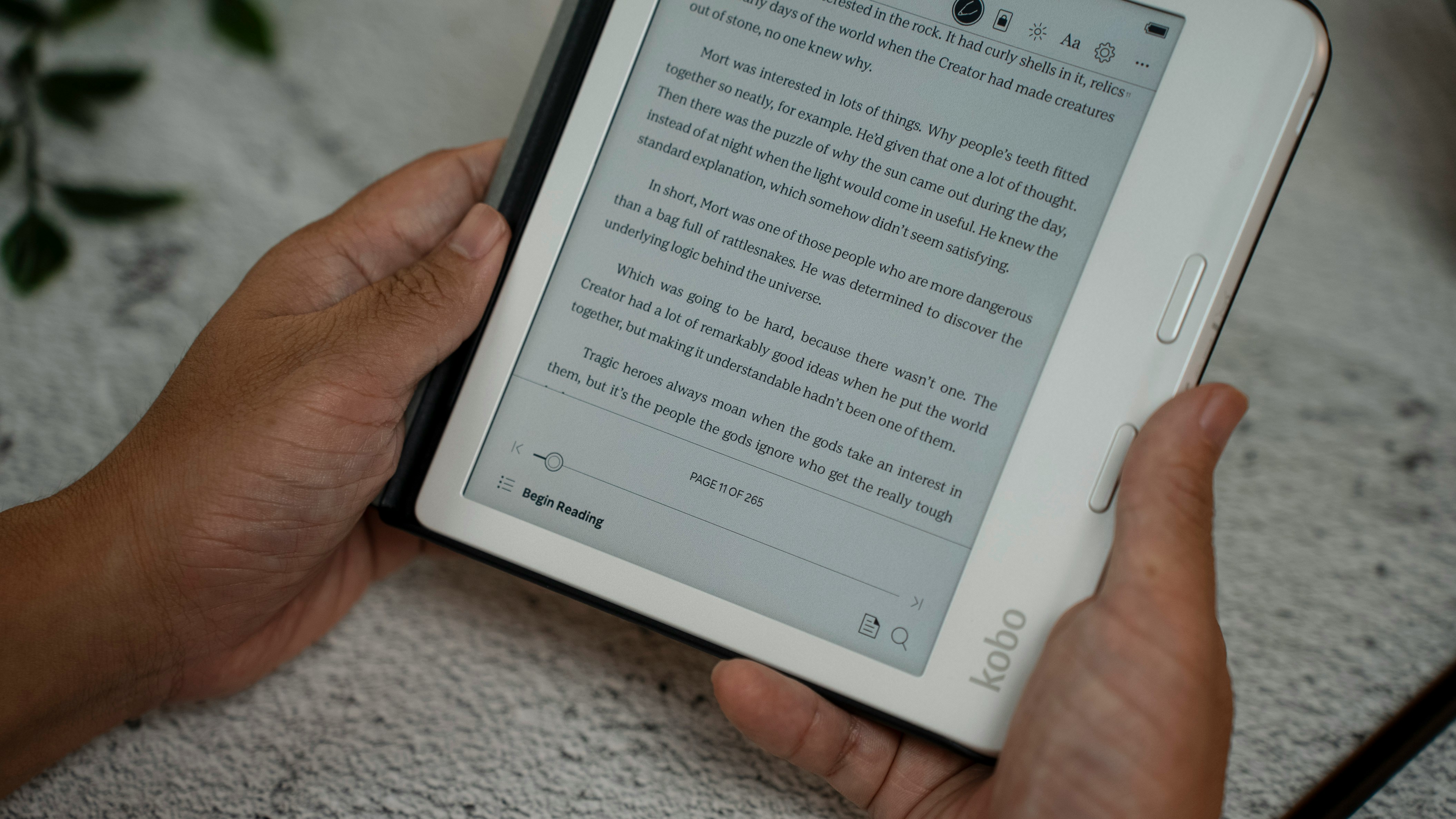Kobo e-reader in hand